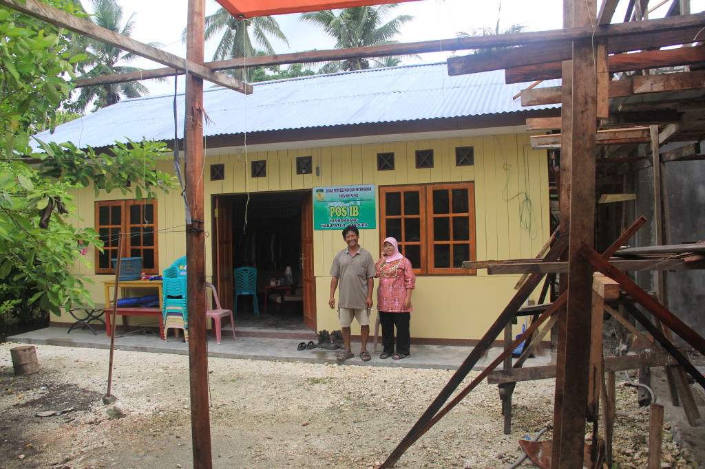 Jamil and Suri in front of their home with new guest house in progress next door