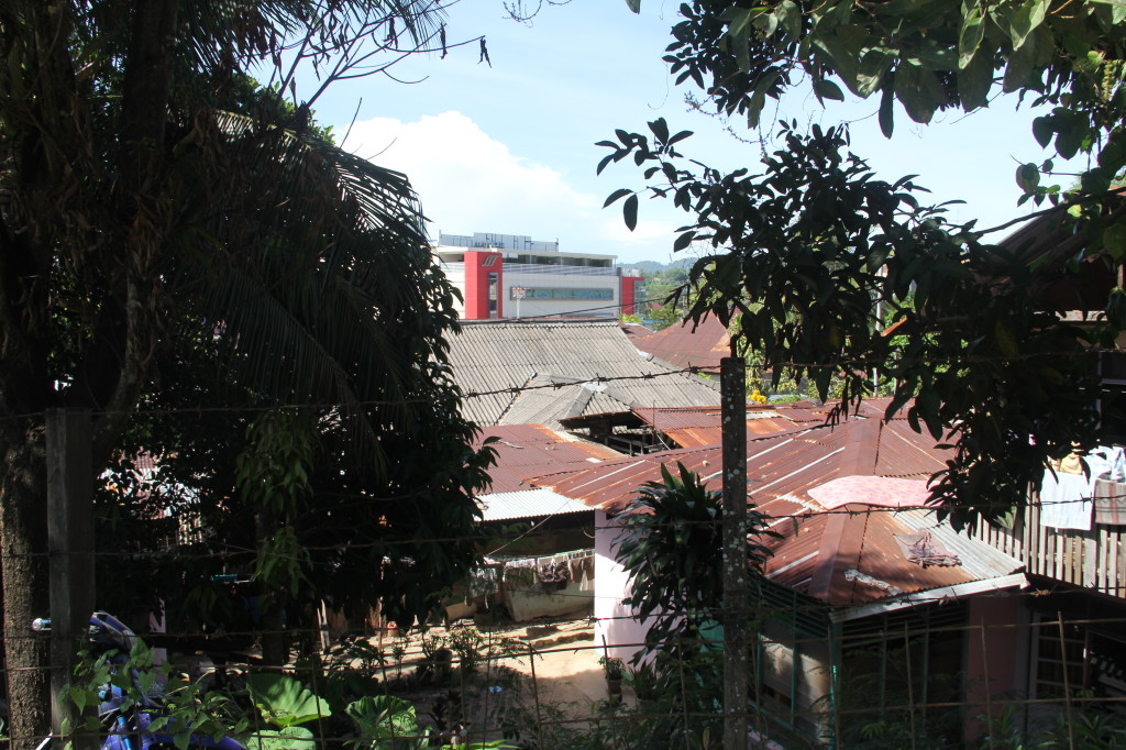 Shanties on hill above Royal Mamberamo Hotel